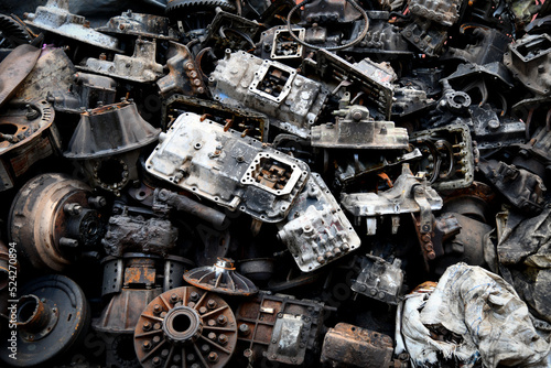 Pile of old machine parts and car spare parts. Rusty and corroded machine parts and car spare parts at Talad Noi, Bangkok, Thailand.
