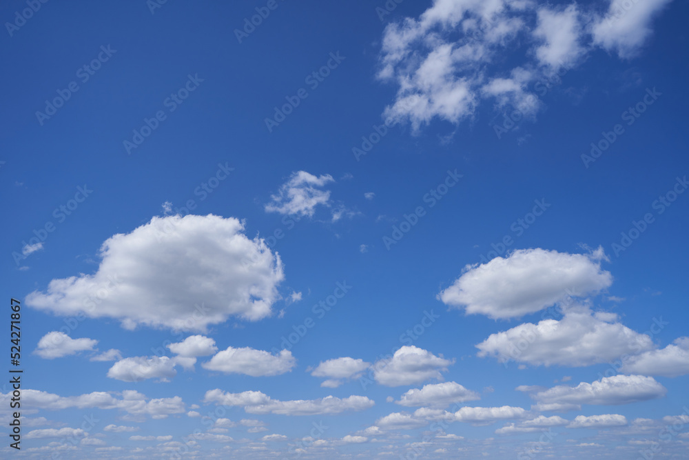 Bright blue sky with clouds to the horizon Bright blue sky with clouds to the horizon