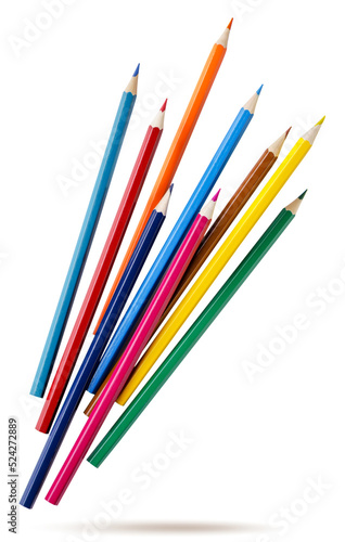 Colored pencils fly on a white background.