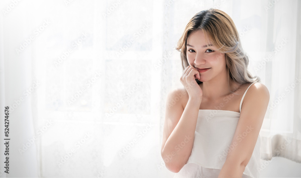 Closeup portrait of beauty asian woman with fair perfect healthy glow with copy space, young beautiful asia girl with pretty smile face. Beauty korean women spa skincare banner Closeup portrait of beauty asian woman with fair perfect healthy glow with copy space, young beautiful asia girl with pretty smile face. Beauty korean women spa skincare banner