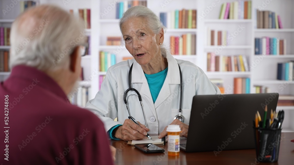 Fototapeta premium Female nurse practitioner doctor talk to senior male patient at hospital, provide professional qualified aid, medicare health insurance program for elderly concept