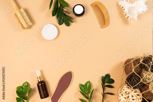 Zero waste, no plastic, eco-friendly concept. Bamboo bath accessories, shells, green leaves on a light background. Space for copying. View from above. Banner.