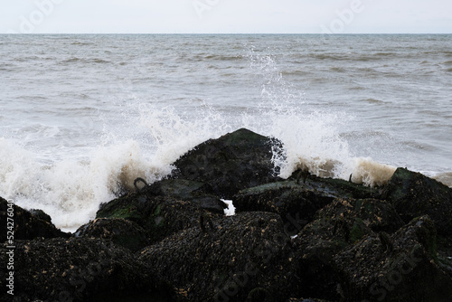 Waves crashing on rocks