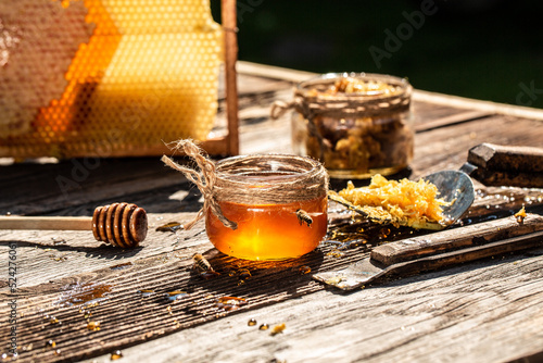 Close up. working bees on honey cells. Bees produce fresh, healthy, honey. Honey background. Beekeeping concept. Long banner format