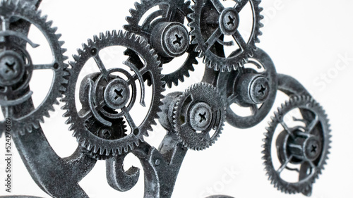 Silver colored gear wheels, steampunk background, texture. Selective focus.