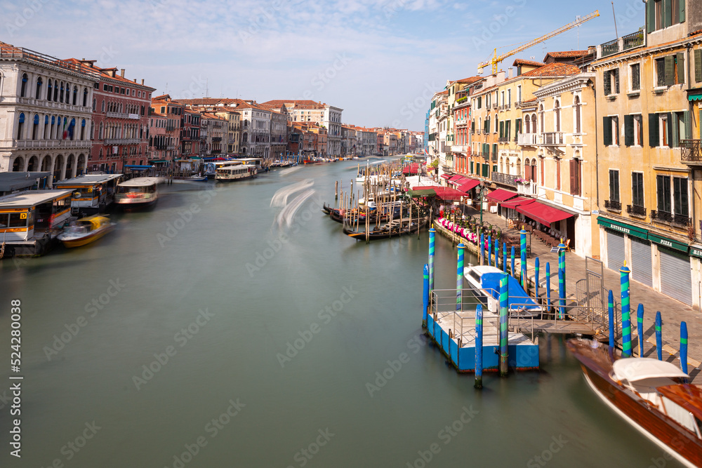 classic Venice scene with canals, boats and historic architecture