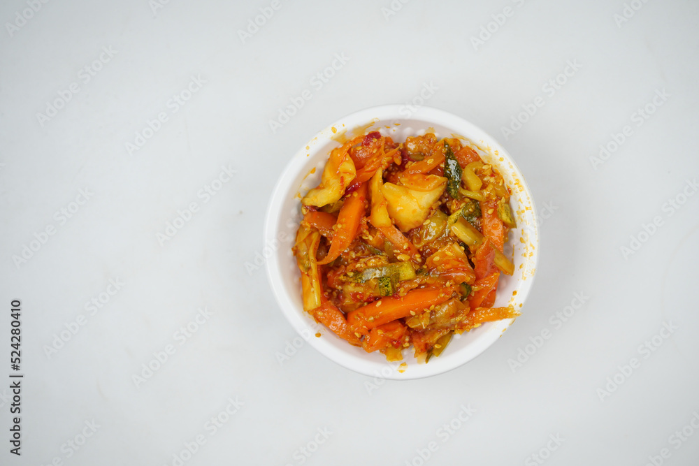 Homemade chili Pickle in a bowl on white 