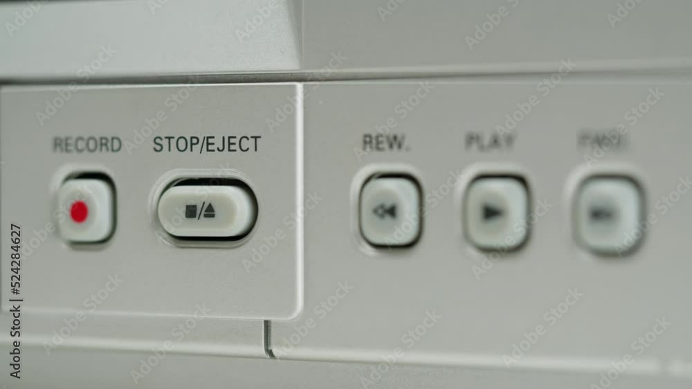 Old video recorder close-up, VHS. Retro player, vintage video cassette broadcasting, audio tape. Old video recorder close-up, VHS. Retro player, vintage video cassette broadcasting, audio tape.