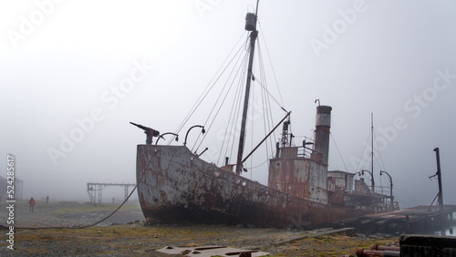 Old whaling ship in the fog, at the old whaling station in Grytviken, South Georgia Island photo