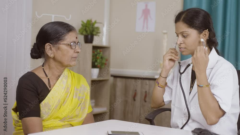 Doctor checking chest pain of suffring sick women at hospital - concept of health care, medical treatment and routine checkup. Doctor checking chest pain of suffring sick women at hospital - concept of health care, medical treatment and routine checkup.