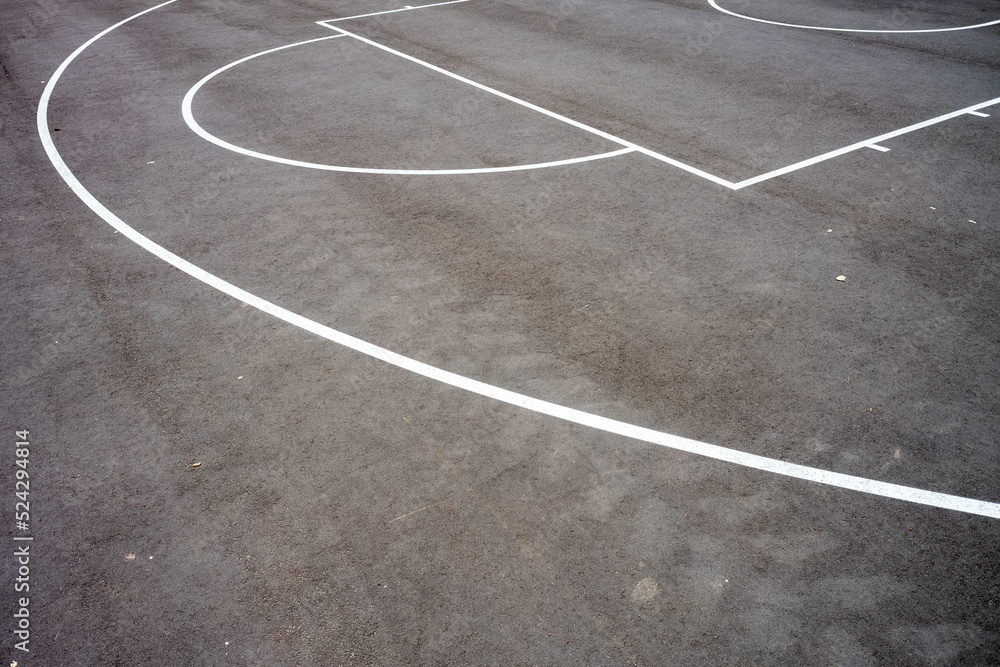 basketball court lines on the asphalt