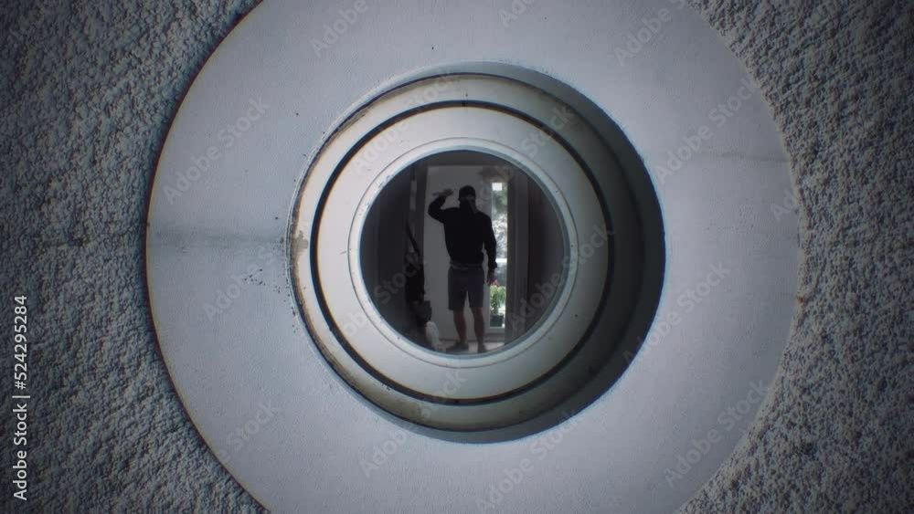 Creepy Peephole Door Psycho Man Knife Assassin Approaching. Hooded