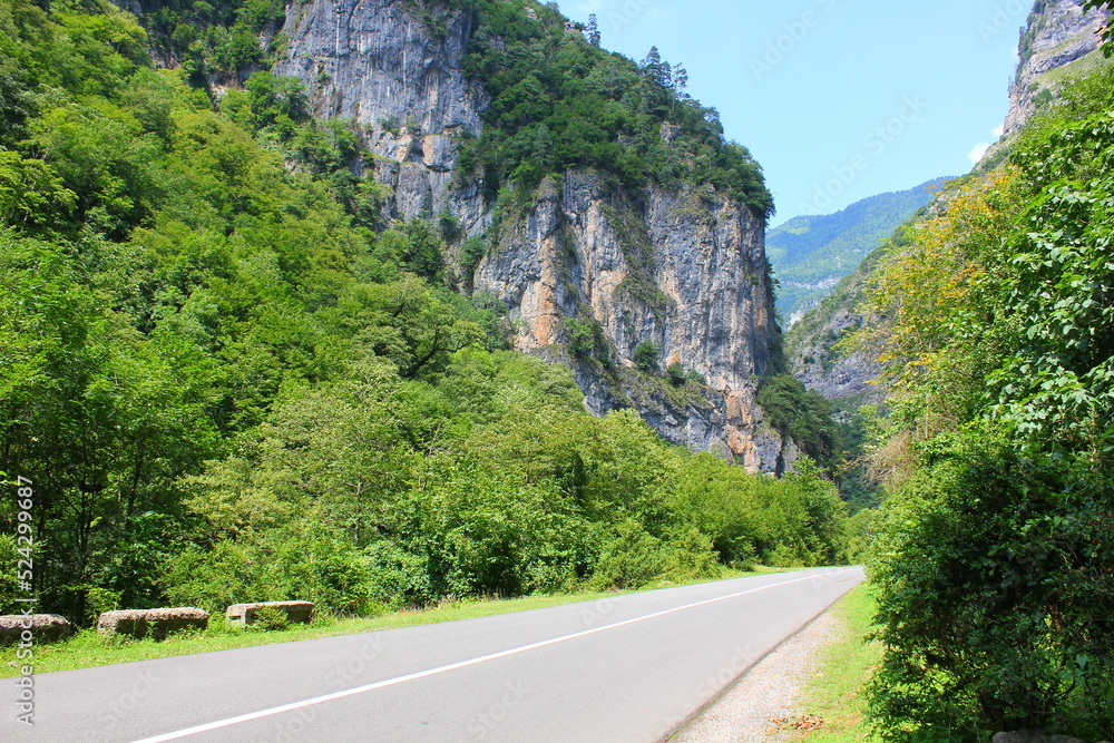 road between high cliffs in abkhazia