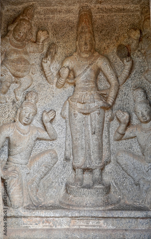 Bas relief rock cut sculptures of gods, people and animals are carved prominently in the monolithic cave temples at Mahabalipuram, Tamil nadu, India