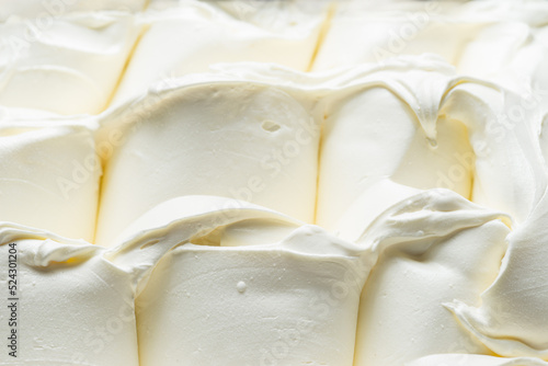 Frozen Dairy cream flavour gelato - full frame detail. Close up of a white surface texture of Ice cream.