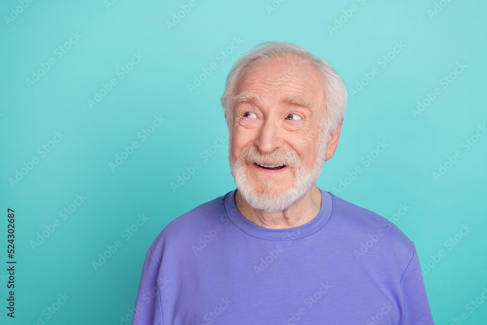 Photo of cheerful minded grandpa look interested empty space imagine isolated on turquoise color background Photo of cheerful minded grandpa look interested empty space imagine isolated on turquoise color background