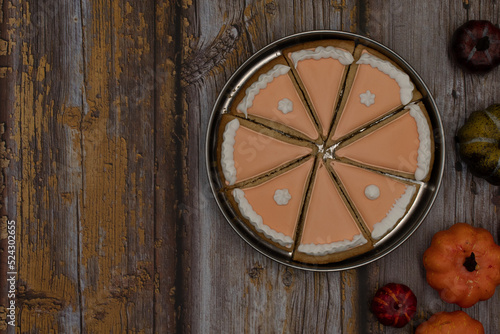 Pumpkin pie cookies on wooden rustic table copy space