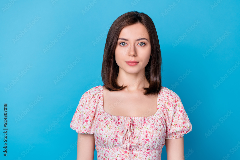 Portrait photo of young attractive gorgeous confident woman wear stylish blouse looking you isolated on blue color background Portrait photo of young attractive gorgeous confident woman wear stylish blouse looking you isolated on blue color background