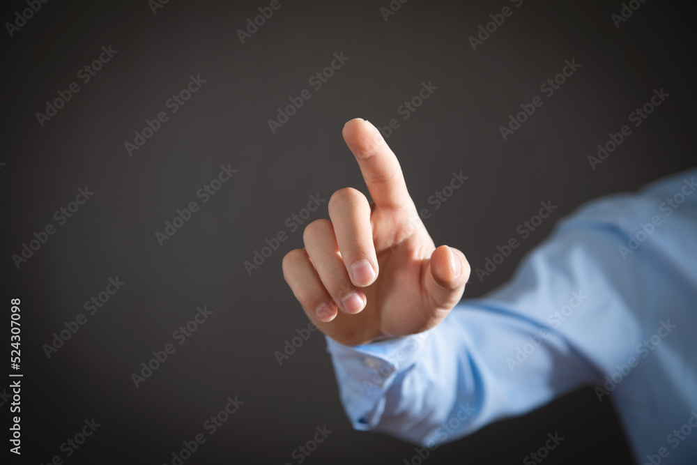 Pointing or touching finger in screen. Pointing or touching finger in screen.