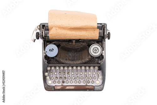 Old retro style typewriter isolated on the white background. Top view.
