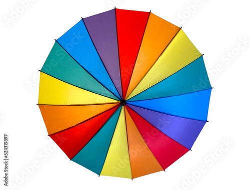 Top of a rainbow covered umbrella on a plain white background. No people.