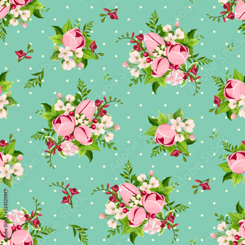 Floral seamless pattern with pink tulip and freesia flowers on a green backgr...