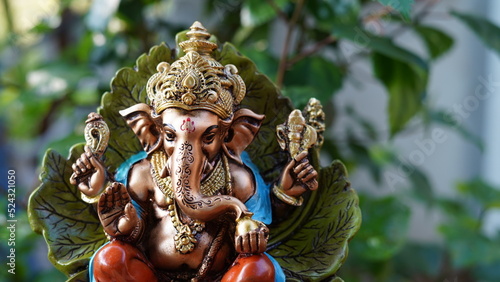 Close up of beautiful Ganesha idol. Ganesh Chaturthi is a Hindu festival celebrating the arrival of Ganesha to earth.