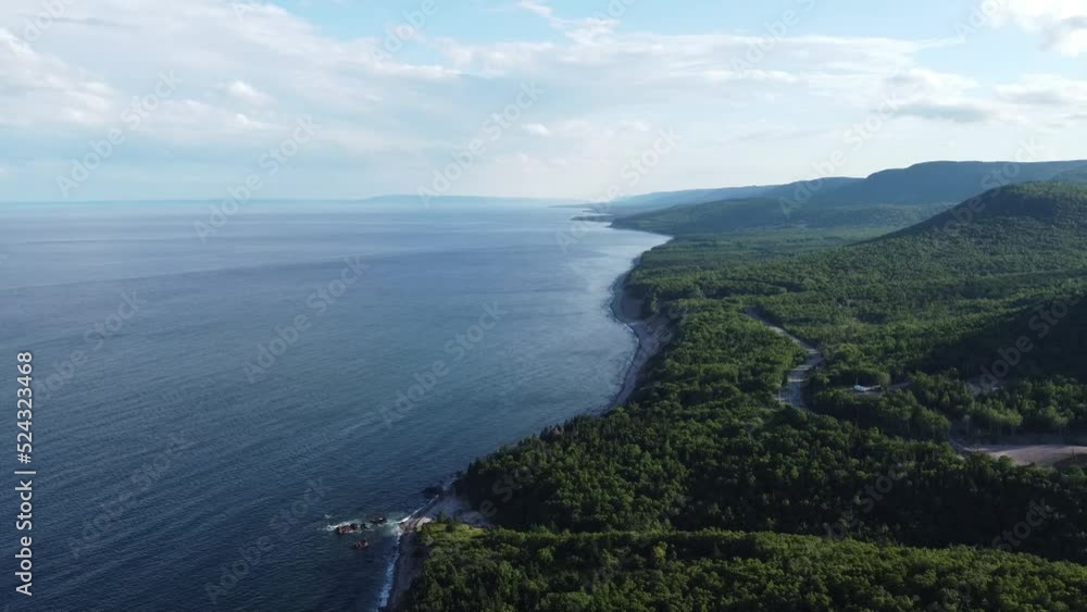 Aerial drone shot of the hills next to the ocean on the Cabot Trail, Nova Scotia Aerial drone shot of the hills next to the ocean on the Cabot Trail, Nova Scotia