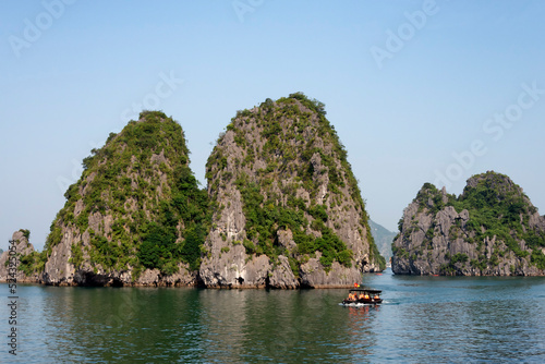 Boat with tourists in Ha Long Bay