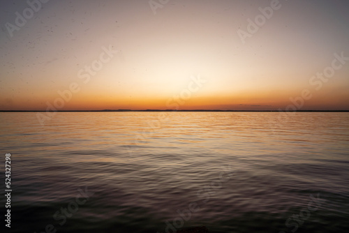 amazing red sunset on the horizon of big silver lake