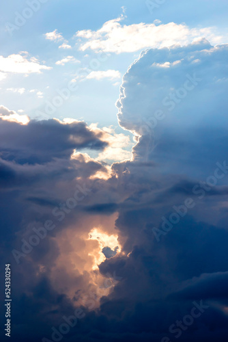 Dramatic colorful sunset or sunrise blue clouds on the sky landscape. Vertical view