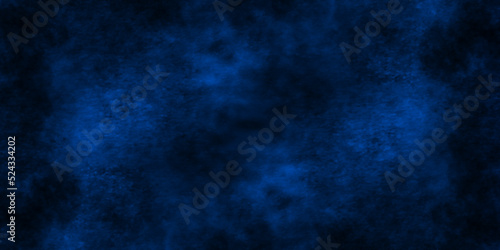 Abstract navy blue blurry and grainy grunge texture, blue texture with colorful blue smoke, decorative and blurry and grunge blue paper texture, Colorful blue textures for making flyer and poster.