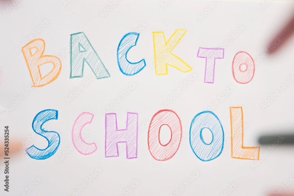 I don't want to go back to school. On white A4 paper sheet written words with different color pencils. Summer ending and new study year beginning. I don't want to go back to school. On white A4 paper sheet written words with different color pencils. Summer ending and new study year beginning.