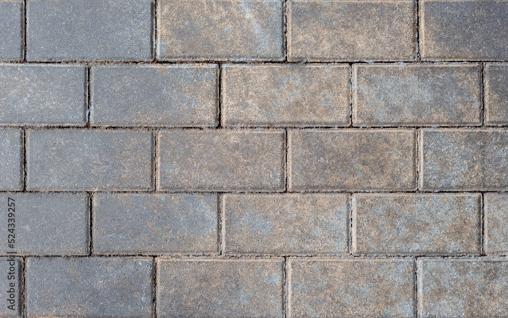 Grey brick wall background close up. Gray stone tile block background with horizontal texture of gray brick. Gray brick surface Grey brick wall background close up. Gray stone tile block background with horizontal texture of gray brick. Gray brick surface