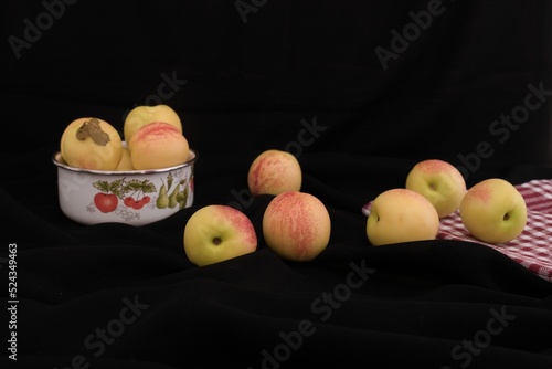  white peach on black background