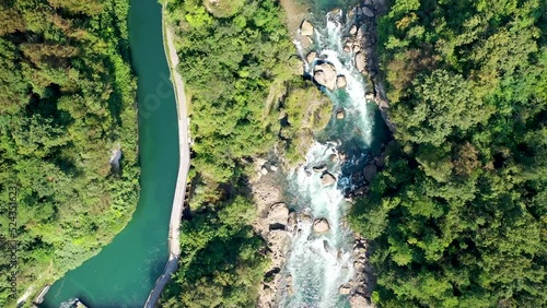 Aerial view of the Adda river with rough water and a lots of rapids, Northern Italy