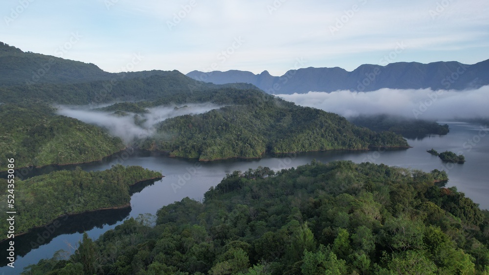 Obraz premium The Mountains and Fjords of Milford Sound and Doubtful Sound, New Zealand. Bengoh Valley, Sarawak.