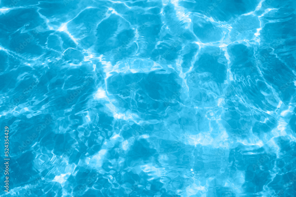 surface of blue swimming pool, or sea or ocean. background of water in swimming pool