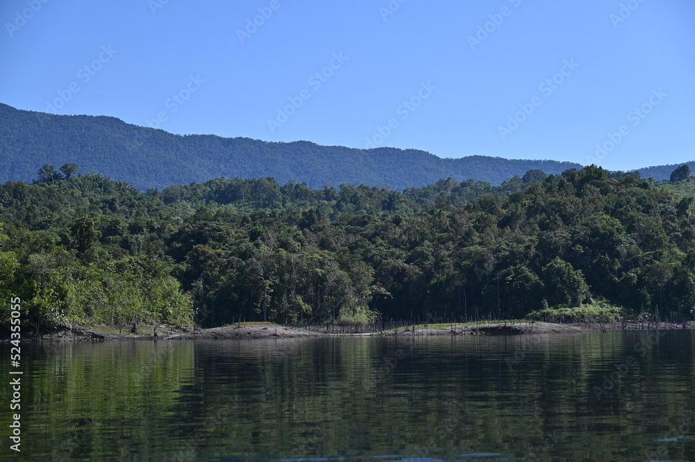 Obraz premium The Mountains and Fjords of Milford Sound and Doubtful Sound, New Zealand. Bengoh Valley, Sarawak.