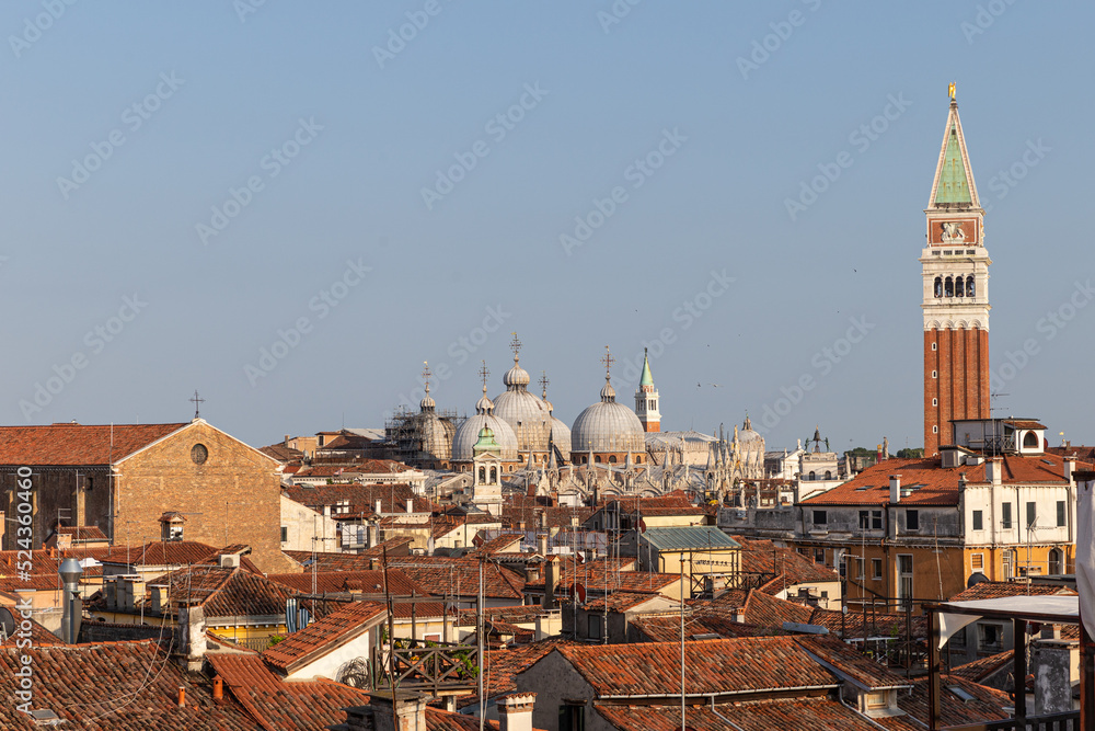 top and aerial view of the canals and roof of venice igrena at sunset