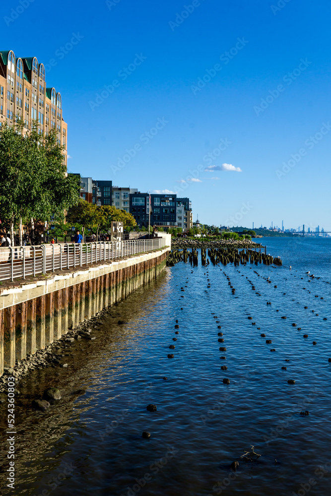 Yonkers, NY - Aug 13, 2022 View of redeveloped Yonkers waterfront. Lined with restaurants, luxury apartments and public spaces.