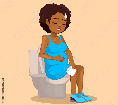 Beautiful worried pregnant woman on bathroom toilet constipation problem