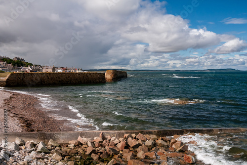Photos beach and sea in Buckie coastal town in Scotland on a sunny day