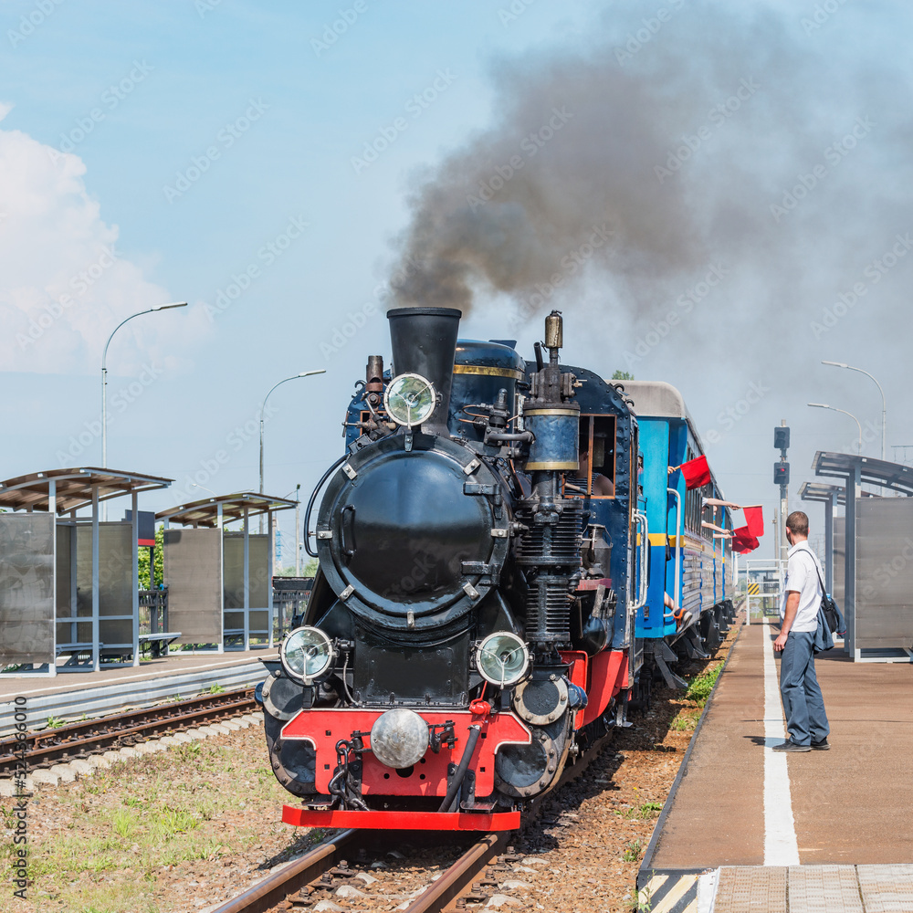 Naklejka premium Steam train of Childrens railway before departure. Saint Petersburg.