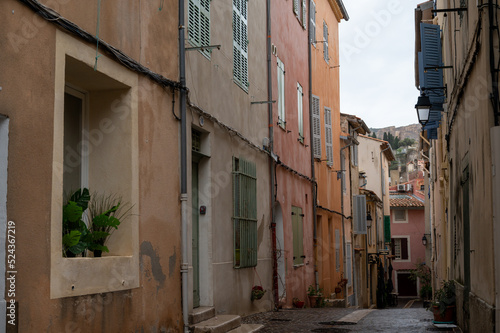 Fototapeta Naklejka Na Ścianę i Meble -  Rainy day in South of France, narrow streets and colorful buildings in Cassis, Provence, France