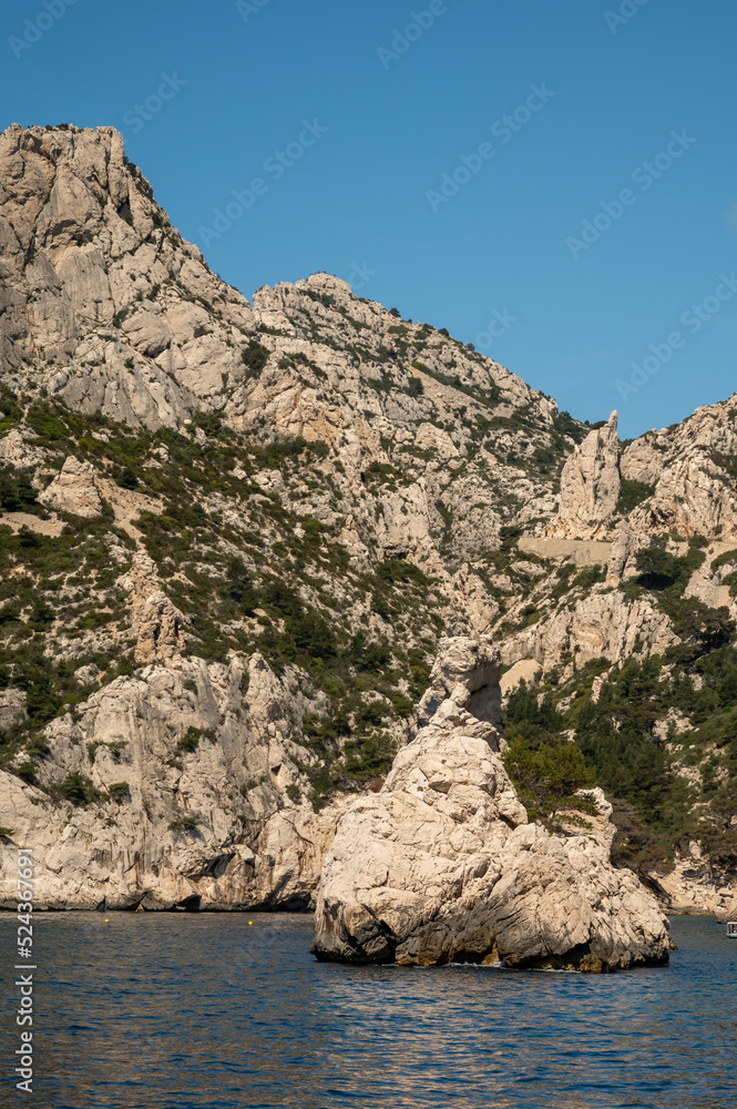 Limestone cliffs near Cassis, boat excursion to Calanques national park in Provence, France Limestone cliffs near Cassis, boat excursion to Calanques national park in Provence, France
