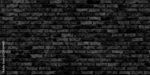 Seamless dark black rough old subway brick wall background texture. Tileable rustic charcoal grey worn grungy brickwork design backdrop with copyspace. High resolution wallpaper pattern. 3D Rendering.