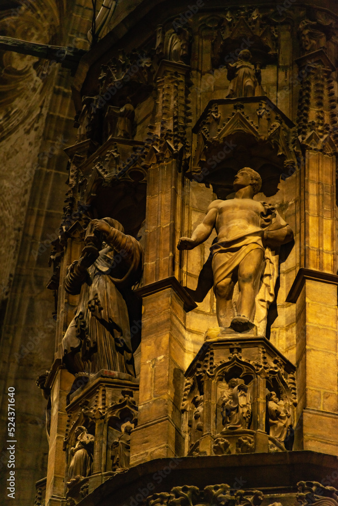 statue of saint inside a cathedral