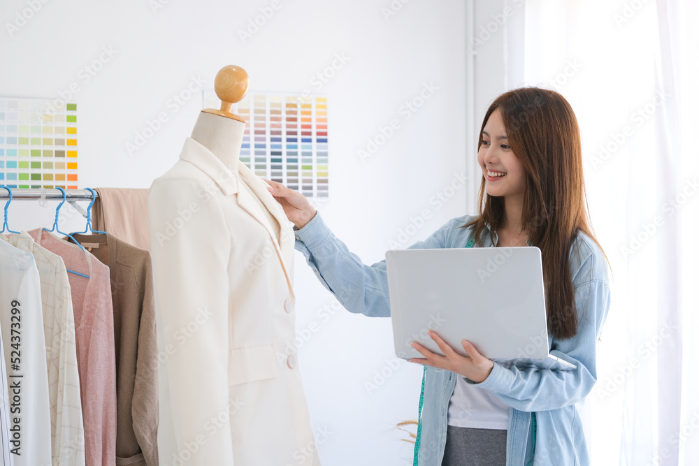 Fashion designer working in studio Fashion designer working in studio