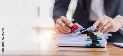 Business accountant document legal, Auditor businesswoman Office employee working with documents at the table workplace, closeup photo